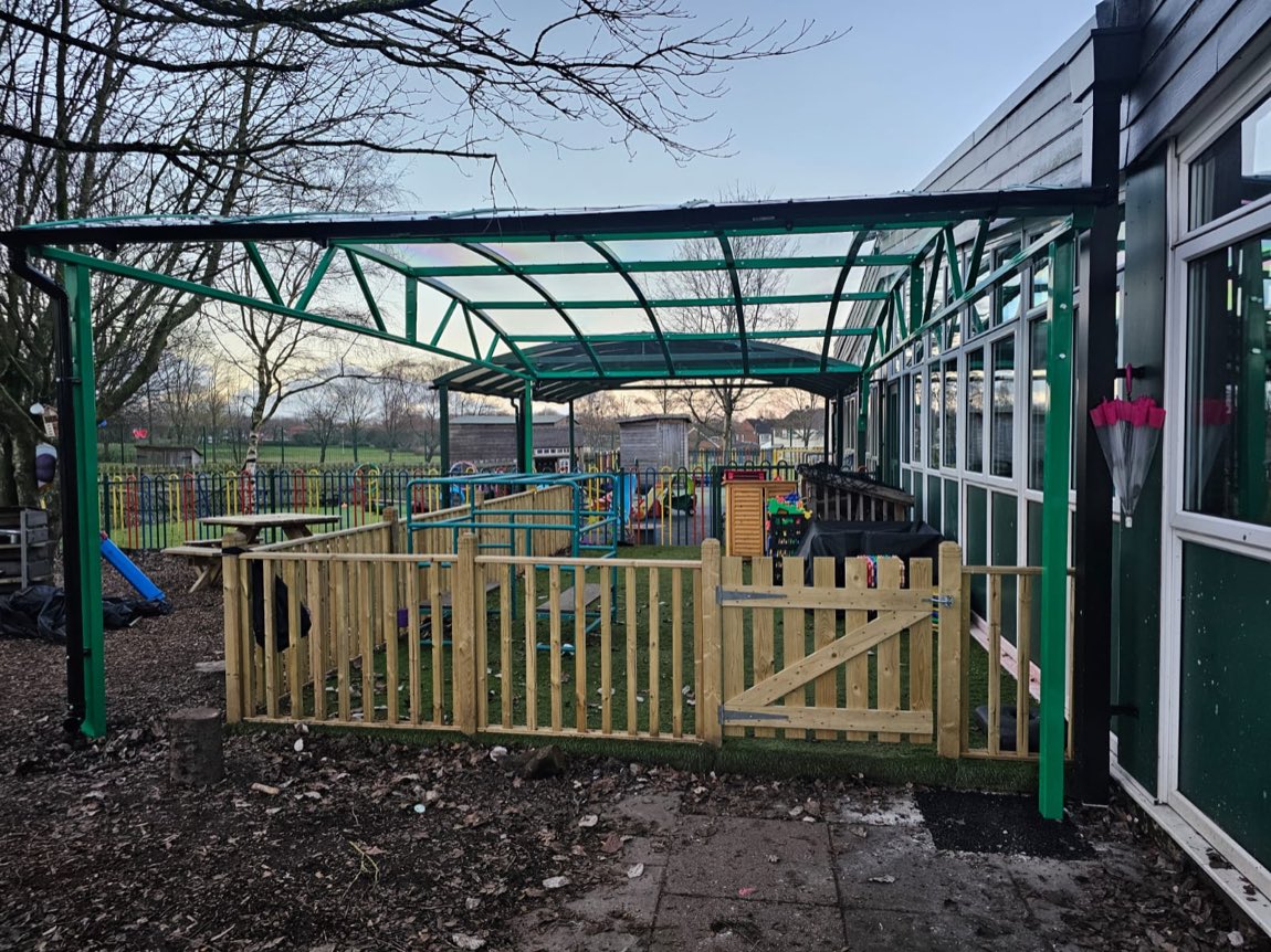 Curved early-years canopy at a school
