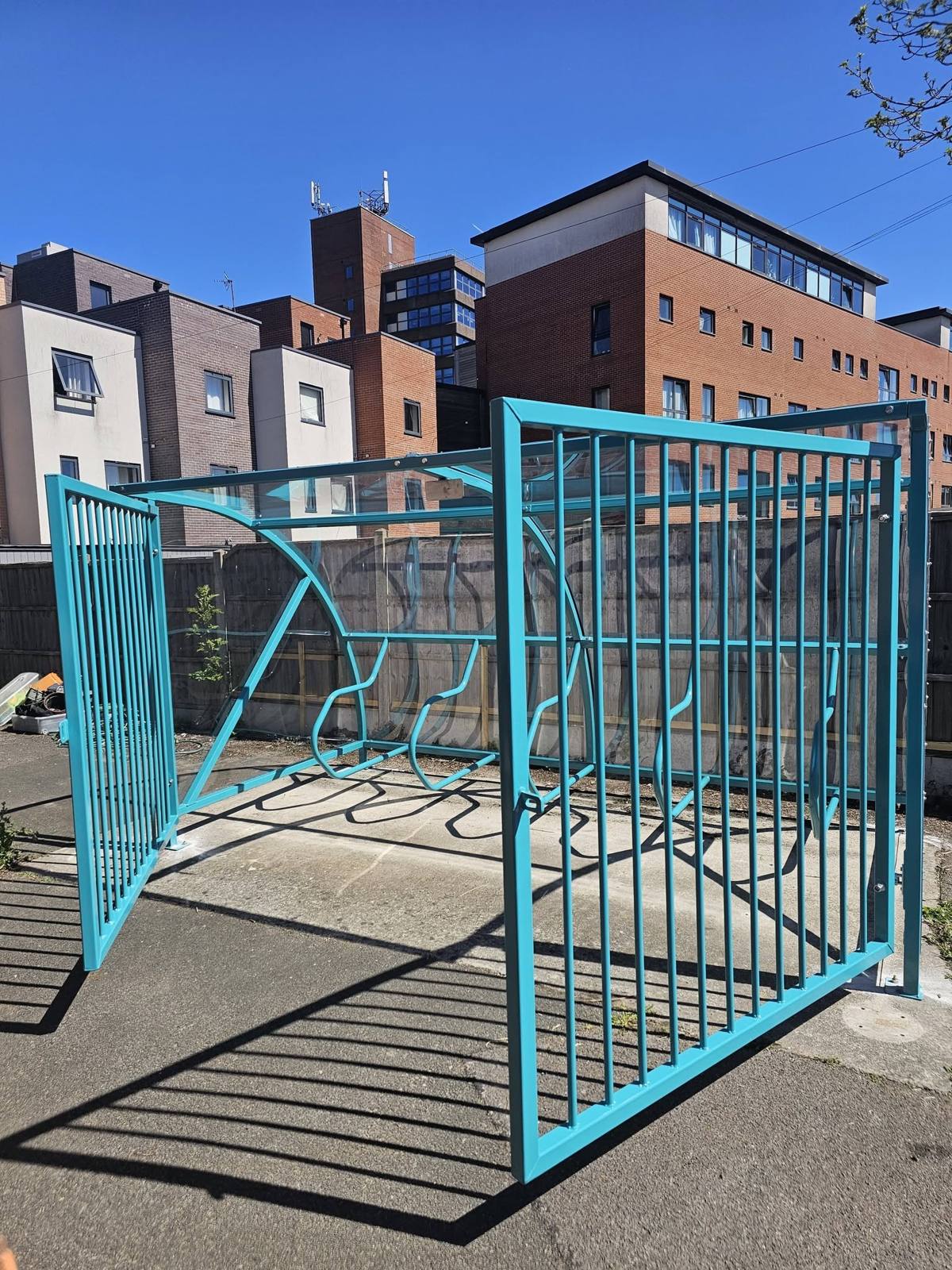 Cycle shelter with security gates, Hideaway Youth Project, Manchester, installed by Canopies & Shelters Ltd