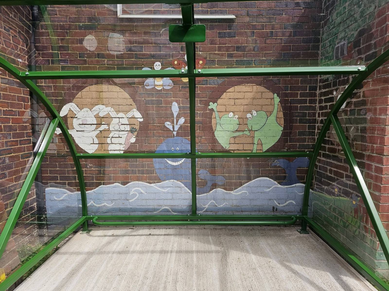 Buggy shelter with security gates, New Beginnings Creative, Birmingham, installed by Canopies & Shelters Ltd
