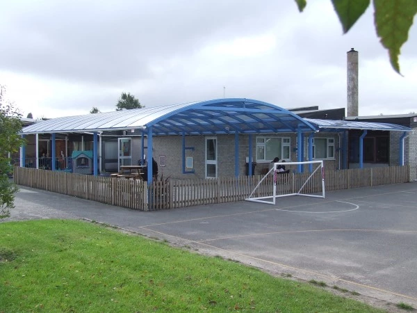 Blue playground canopy at a school