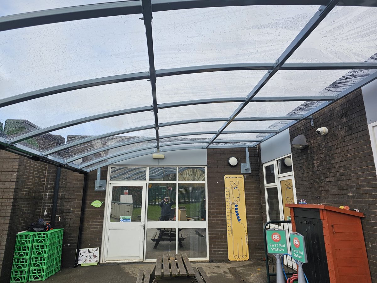 Curved-roof canopy at a school