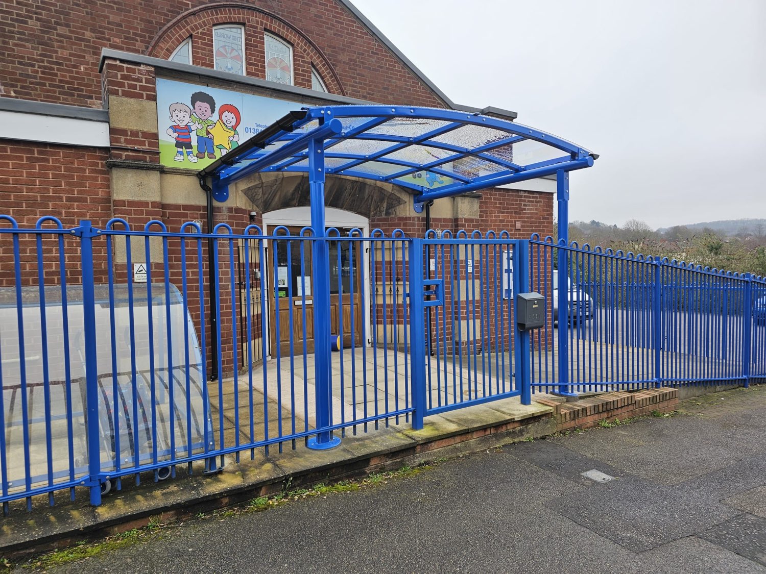 Curved entrance canopy at a school