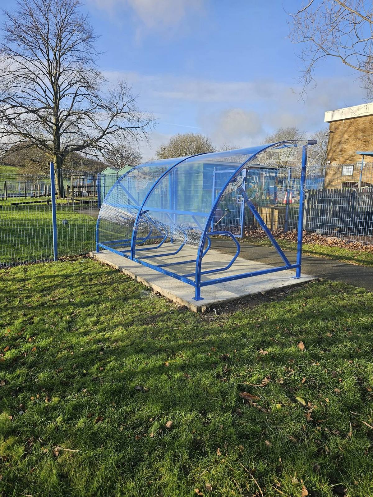 Two cycle shelters & scooter rack, Woodside Academy, Bradford, installed by Canopies & Shelters Ltd